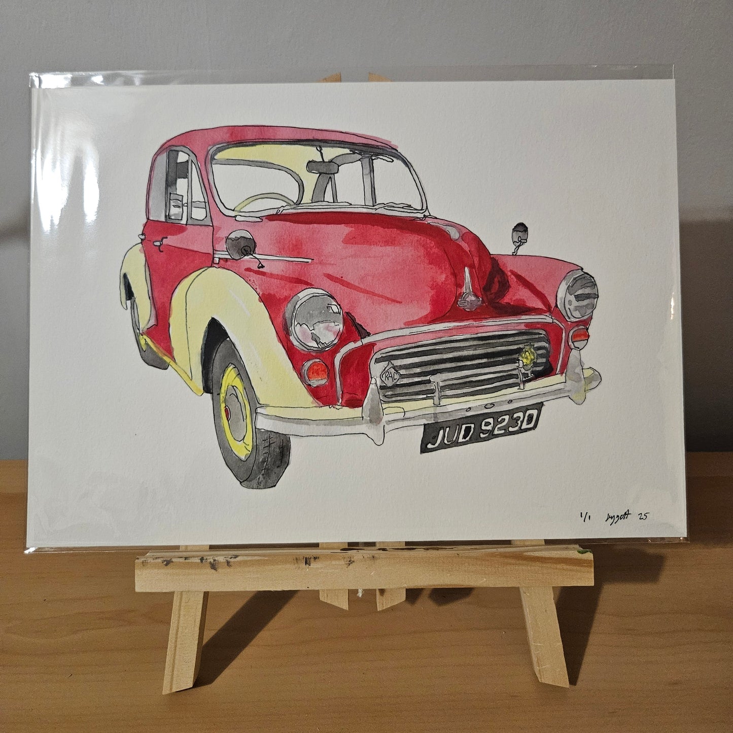 Original signed print of a red and cream morris minor 1000 Jude in A4.
