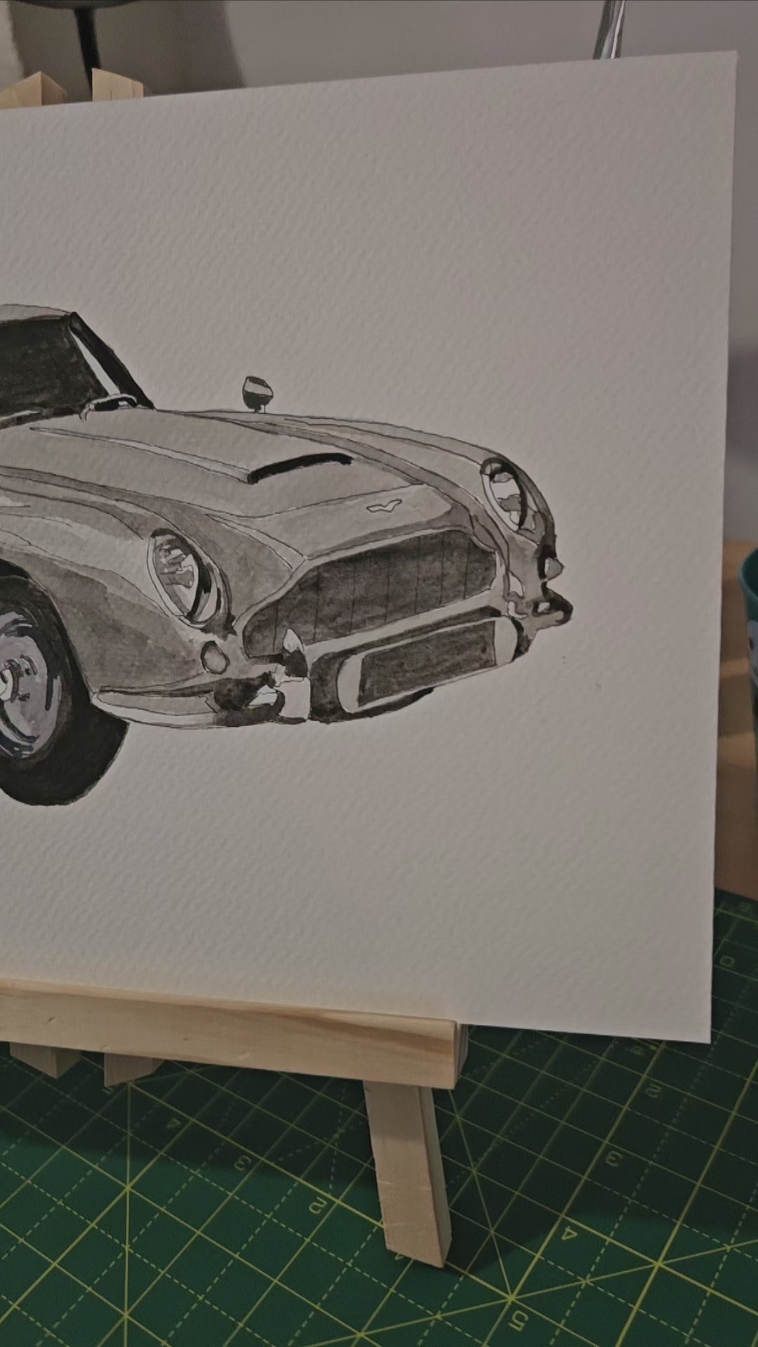 Video of an Aston Martin DB5 painting on watercolour paper.